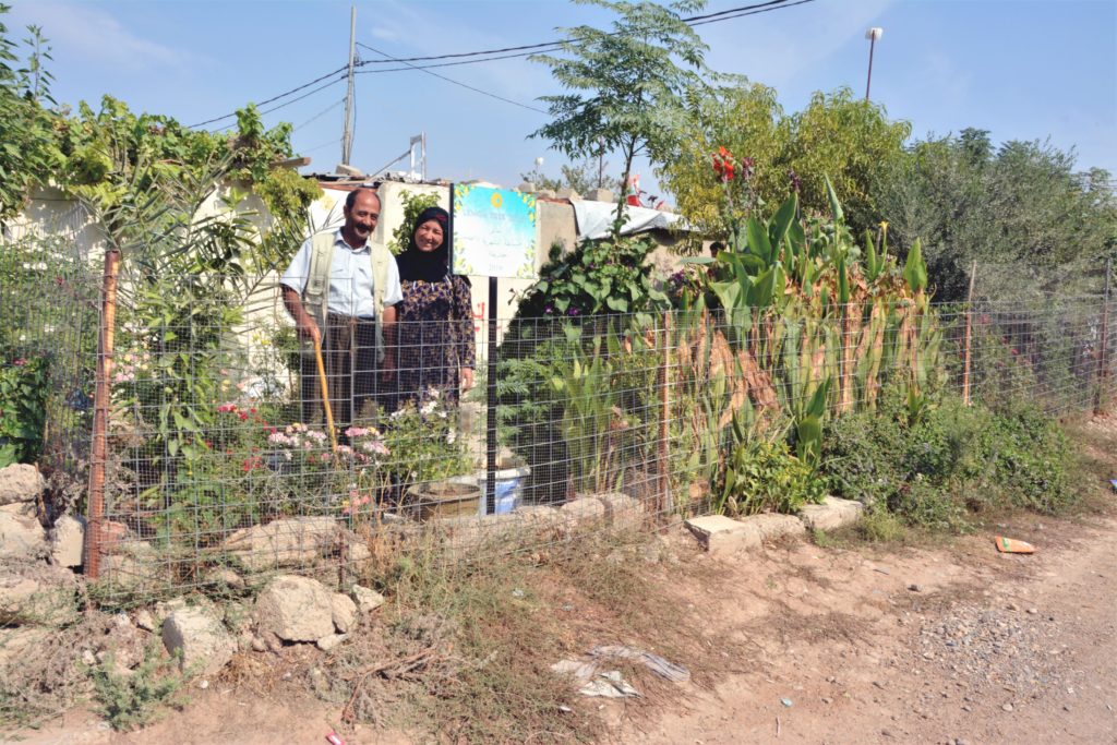 Muhammed Hssen and Zainab Abdullah standing in their garden
